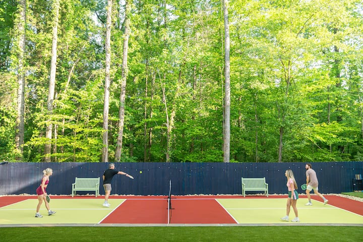 A doubles game on the pickleball court
