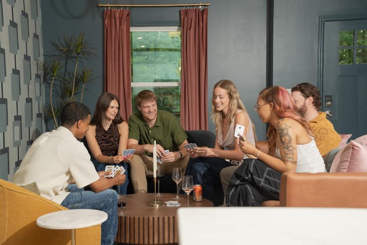 A card game in the living room