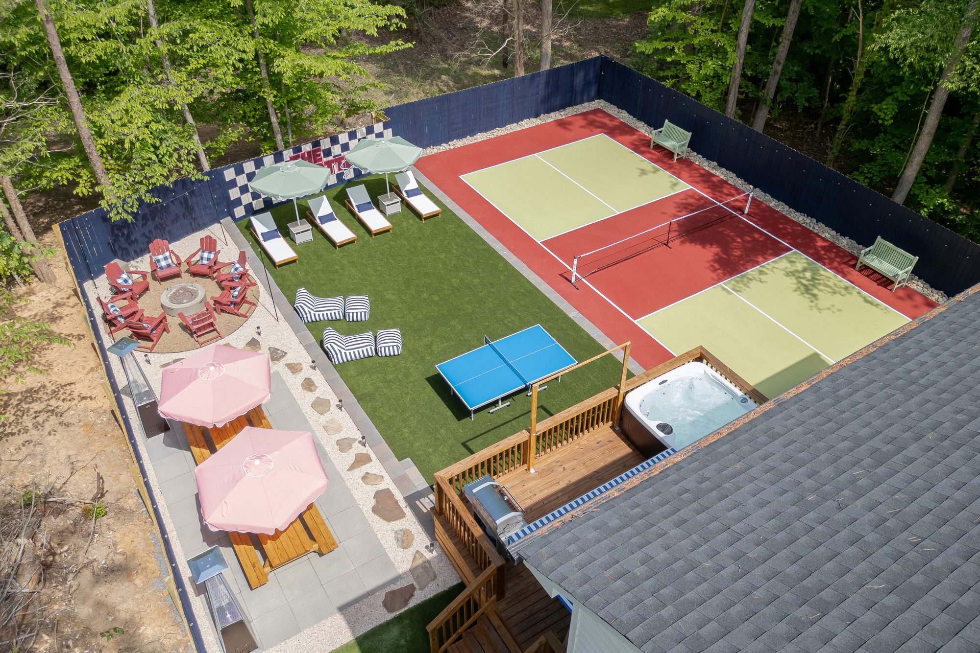 Aerial view of The Charlotte Social — pickleball court, hot tub, fire pit, putting green and lounge areas